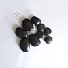 Cheaper home decorative polished stone pebbles colorful BLACK artificial stone plastic pebble for landscaping garden