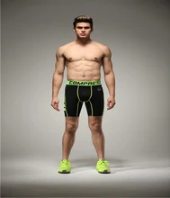 Brand Sexy Mens Workout Tights Elastic Gym Running Shorts Tight Fitness & Bodybuilding Mid Waist Trunks Compression Track Pants