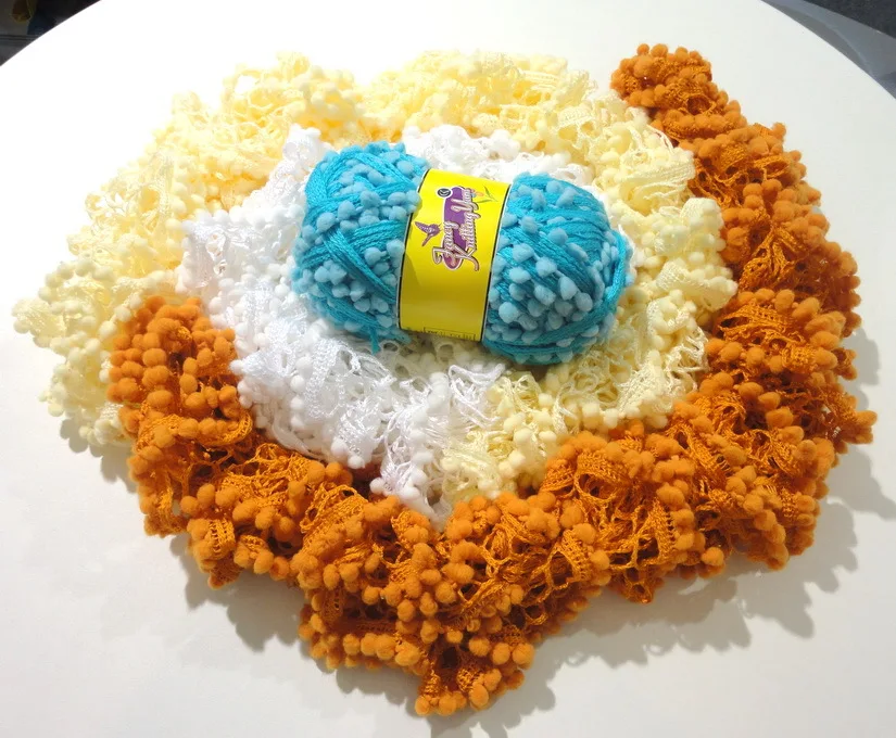 ruffle fishnet pom pom yarn