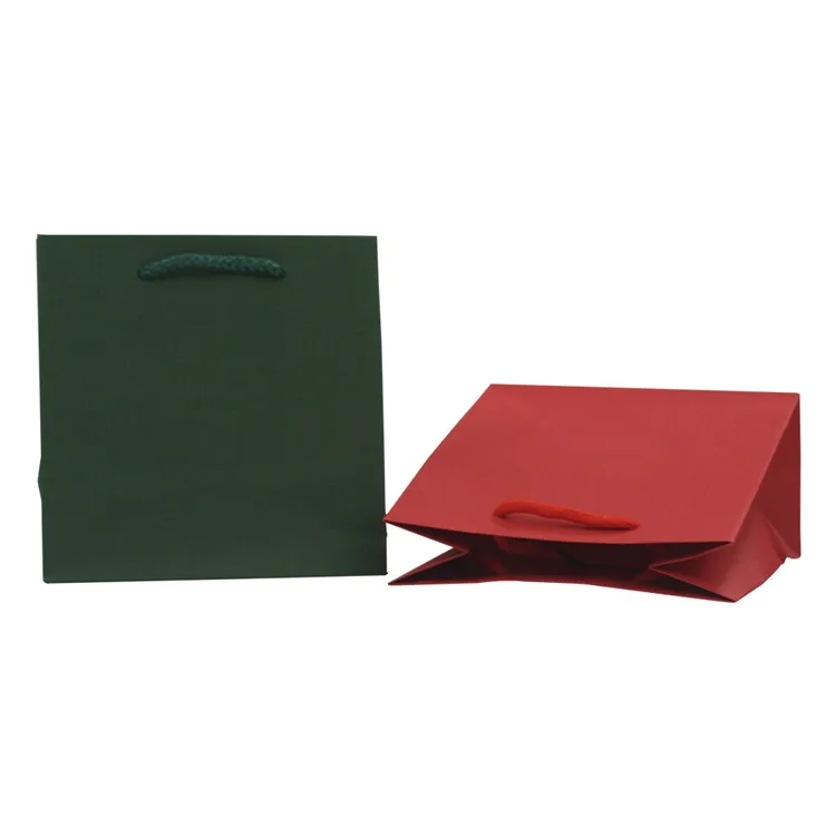 New design customize solid color foldable stand up storage kraft paper bag with rope handles