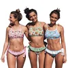 Women's swimwear prints two sexy bikinis next to the leaves