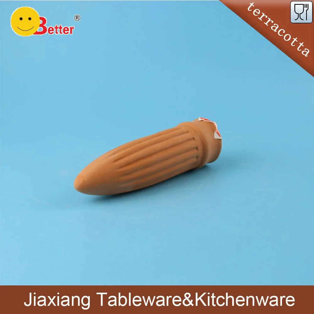 terracotta water dropper.jpg