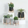 Cylinder shape frosted surface garden decorative ceramic planter pot with wood stand