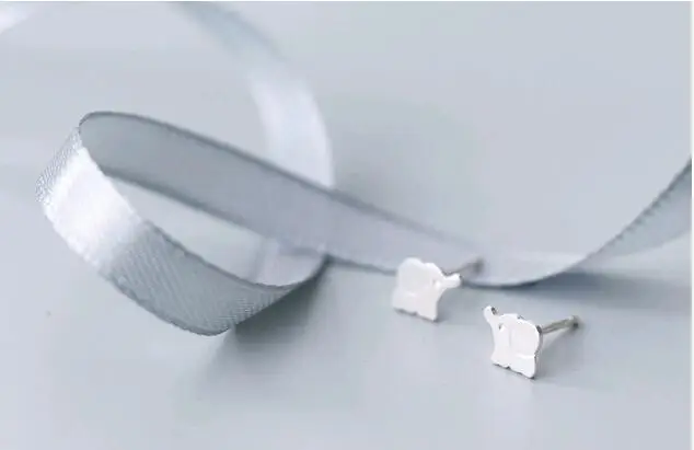 lovely simple 925 sterling silver brushed mini elephant ear studs.jpg