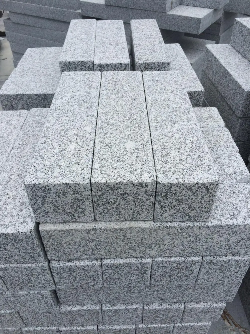 Flamed G603 granite paving stone.JPG