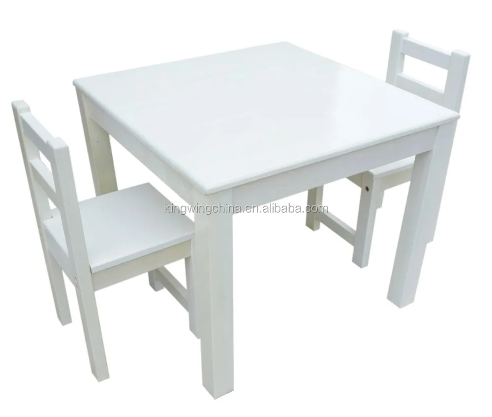 white wooden kids table and chairs