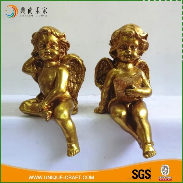 Creative wholesale OEM small gold sitting resin angel wings
