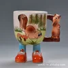 Wholesale tea cup 3 d animal handle the foot ceramic mugs