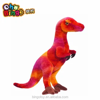 red stuffed dinosaur