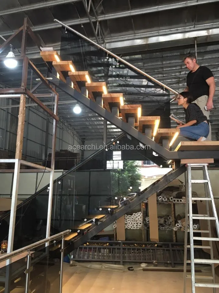 Curved Helical Staircase with Frameless Glass Railing