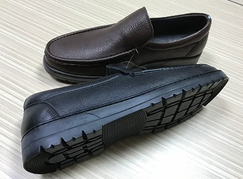 branded leather shoe.png