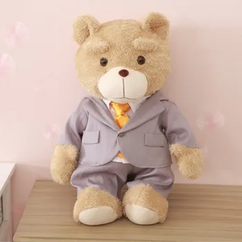 teddy bear wearing a suit