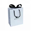 Cheap Custom Small Retail Cosmetic Packaging Promotion Gift Shopping Paper Bag With Rope Handles