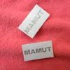 Shiny silver metallic thread logo woven label
