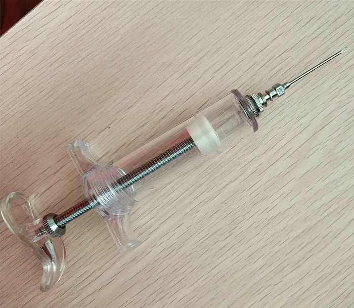 plastic steeel syringe.jpg