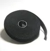 Continuous hook and loop strap adhesive dots for cable management wrap