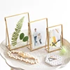 China cheap vintage decorative gold brushed metal photo frames with stand for tables