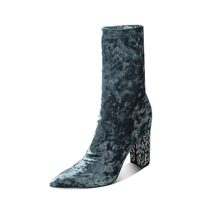 snakeskin pointed toe boots