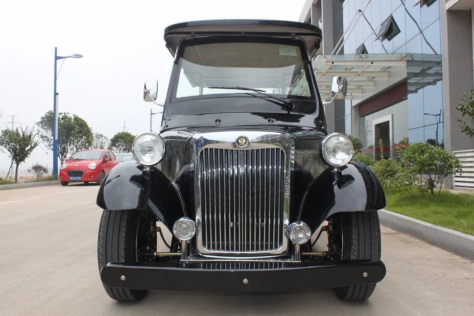 Old fashioned 6 seater electric scooter car automobile