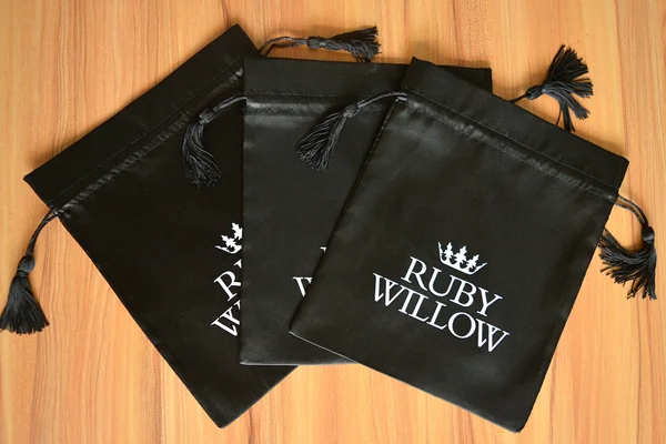 Black satin bag with white logo1 (2).png