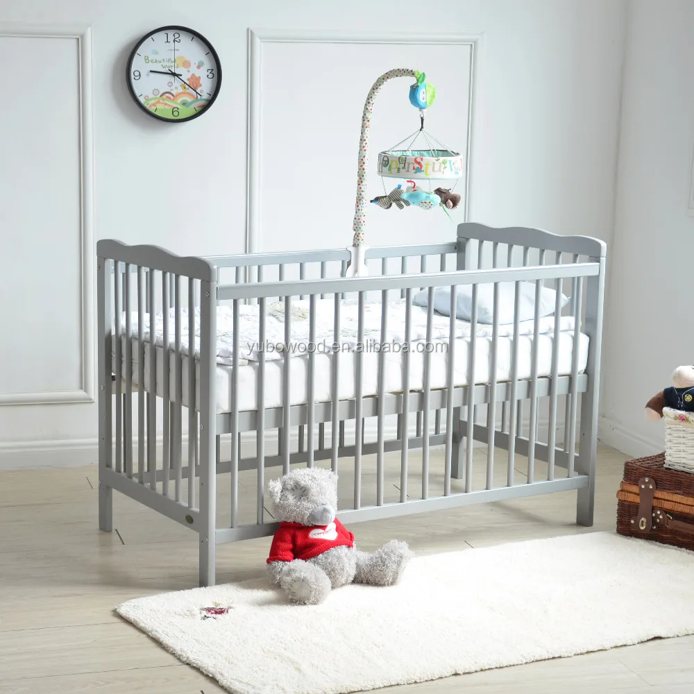 grey wooden cot