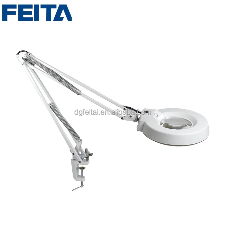 reading lamp with magnifying glass