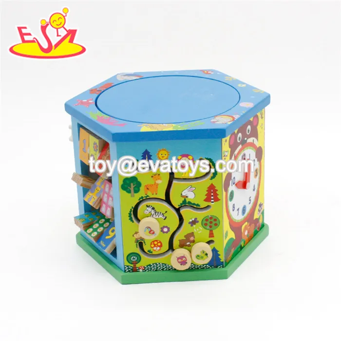 large wooden activity cube