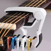 /product-detail/best-selling-high-quality-custom-logo-metal-aluminum-alloy-bass-acoustic-guitar-capo-guitar-tuner-60768451416.html