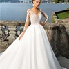 wedding apparel Best selling lace long sleeve bride dresses women elegant white long train wedding dress bridal gown Turkey