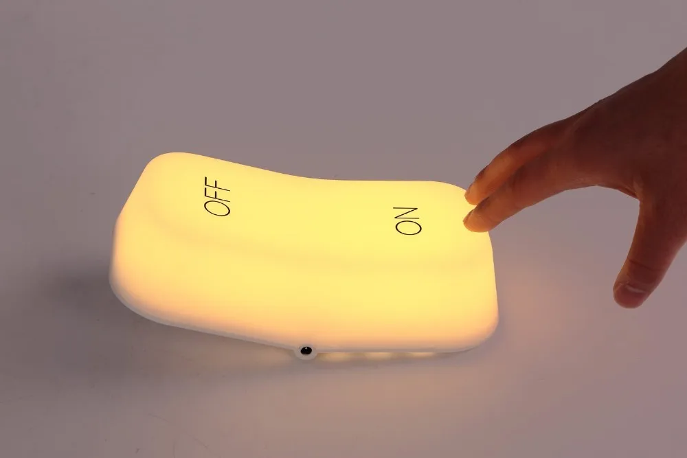 Novel LED baby night light with ON-OFF button shape and gravity sensor