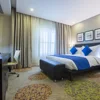 Comfortable hotel executive business suite room design