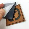 Custom Jeans Denim Garment Embossed Logo PU Fake Leather Labels Patches with Self Adhesive Back