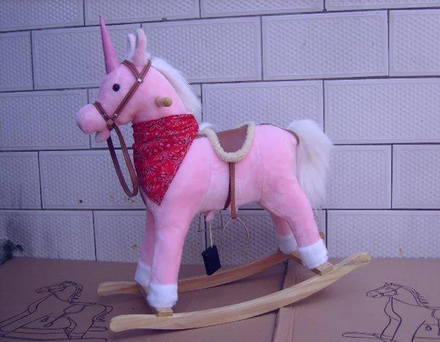 plush unicorn rocking horse