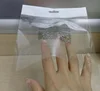 Customized self adhesive backed opp plastic packing bags package