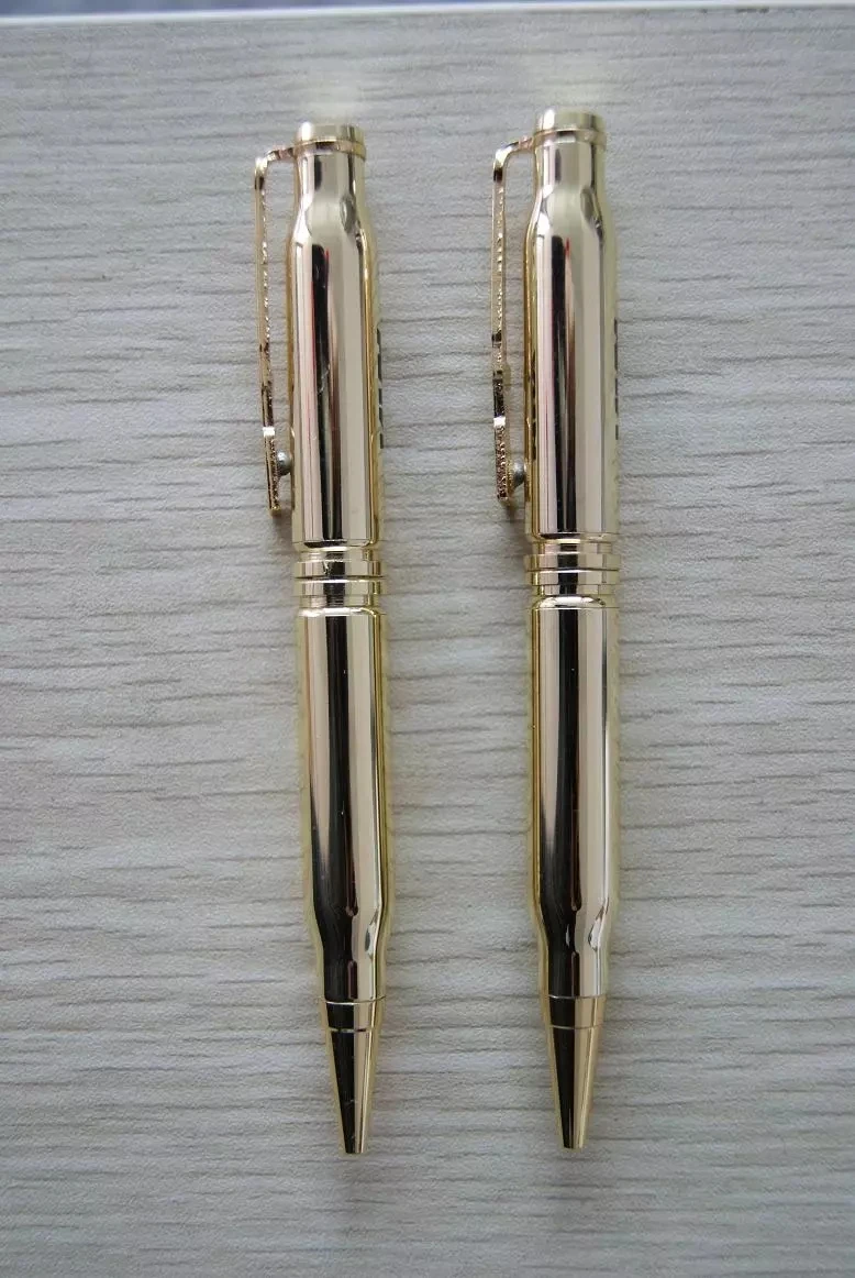 gold gun pen.jpg