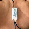 China Supply Custom Fashion Design Price Clip Hang Tag Plastic String for Clothing