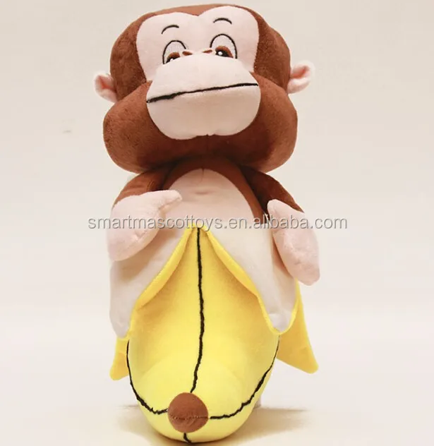stuffed toy monkey with banana