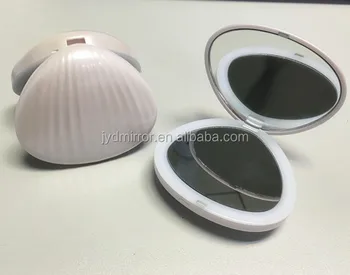 small magnifying mirror with light