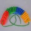 Qianli Plastic button toy with strings