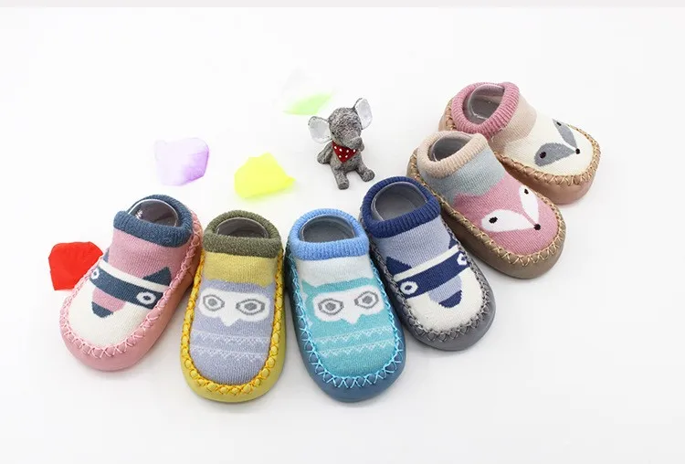 baby socks with shoes printed on them
