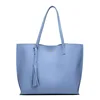 /product-detail/new-fashion-women-wholesale-large-faux-leather-shoulder-tassel-tote-leather-bag-for-ladies-60824833914.html