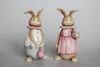 Male rabbit eggs/female rabbit holding 2 drawings furnishing articles
