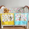 Baby bedside hanging storage bag Multifunctional cartoon baby diaper storage bag