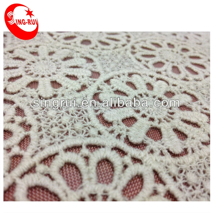 white crochet lace fabric