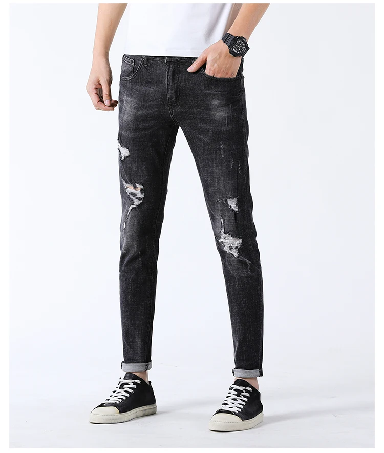 black damaged jeans