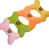 China 2019 new hot sale pet molar product red green and yellow color vocal wear resistant bones dog chew toys for fancy