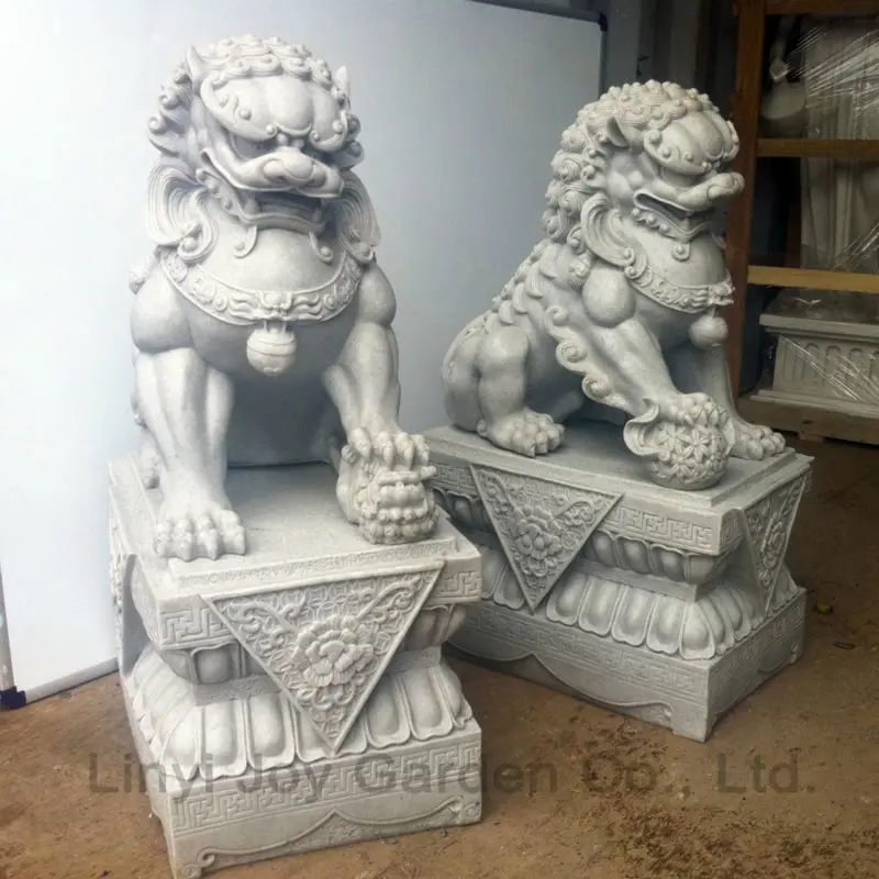 white foo dog statues