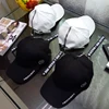 A new all-match face female zipper peaked cap long black baseball cap visor tape letters