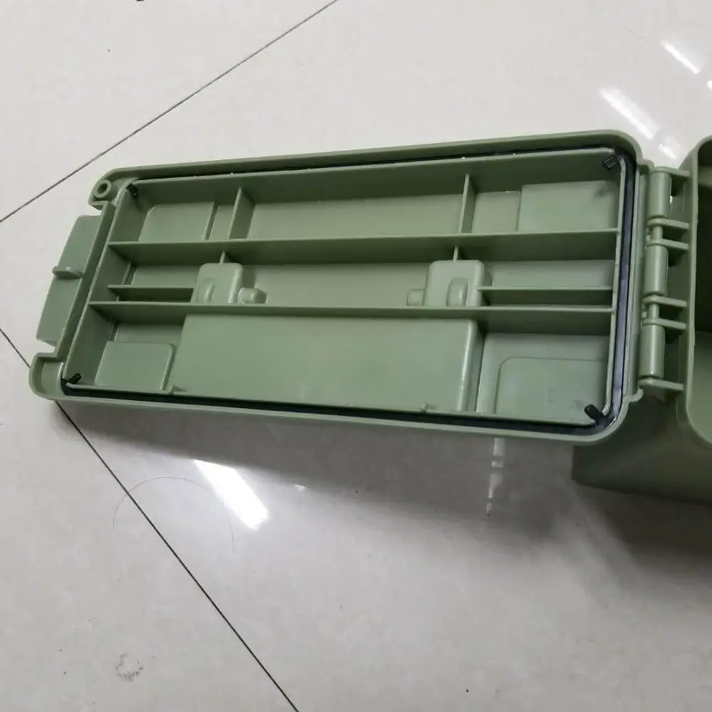 One green Plano ammo box.