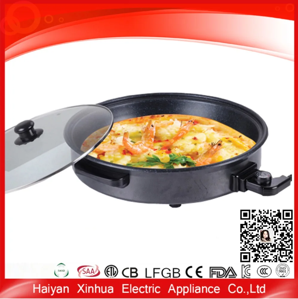 black round nonstick electric pizza pan with glass lid